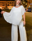 Elegant chiffon dress with rhinestones, polyester and elastane, suitable for special occasions.