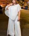 Elegant chiffon dress with rhinestones, polyester and elastane, stylish design, suitable for formal events.