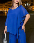 Elegant chiffon dress with rhinestones, polyester and elastane, suitable for special occasions.