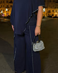 Elegant chiffon dress with rhinestones, polyester and elastane, for stylish and refined appearance.