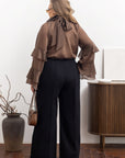 Stylish women’s blouse with ruffles and a high neckline от YR, изработена от tencel и cotton, показана на изображението.