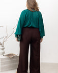 Stylish women’s blouse with a high collar and ties , марка YR, 100% polyester, изображение на моден модел.