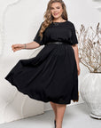 Elegantní midi šaty s elastickým pasem a páskem