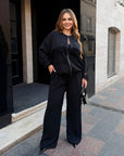 Bomber jacket and trouser set with mesh, polyester, viscose and lycra, in fashionable sporty style, shown on a model.
