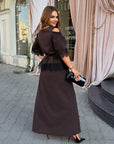 Set with a long skirt and lace, made from polyester, viscose and lycra, with an elegant design and delicate details.