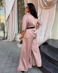 Satin set with a belt, made from polyester and elastane, with delicate design and luxurious look.