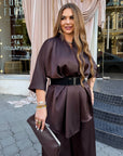 Satin set with a belt, soft and luxurious, made from polyester and elastane, shown in the image.