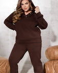 Satin set with a belt, made from 97% polyester and 3% elastane, shown in the image.