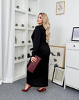 Stylish midi dress with a slit made from polyester, viscose and lycra, with an elegant design and fashionable silhouette.