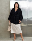 Short fluffy cardigan with belt