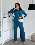 Two-piece set made from polyester and elastane, with fashionable design, shown in the image.