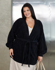 Short fluffy cardigan with belt