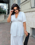 Satin blouse with lace, polyester and viscose, elegant design, shown in the image.
