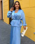 Satin kimono with a belt made from polyester, viscose and elastane, shown in the image.