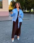 Satin kimono with a belt made from polyester, viscose and elastane, with a smooth texture and elegant design.