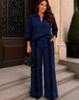 Set with wide-leg trousers made from polyester and viscose, image of fashionable women's clothing.