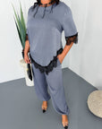 Satin set with lace, containing polyester, viscose and elastane, with delicate lace details and elegant design.