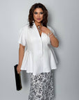 Conjunto falda y blusa con peplum
