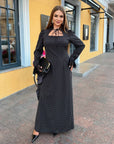 Long dress with a removable peplum belt, polyester and elastane, stylish and elegant for special occasions.