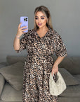 Animal print jumpsuit made of polyester, modern and stylish, with visible details and cut in the image.