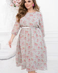 Лятна Chiffon dress YR на Twiggy Shop, с дълги Sleeveи и нежна цветова гама, лежаща на заден фон.