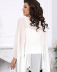 Elegant chiffon dress with cape, made from viscose and polyester, in gentle colours, suitable for special occasions.