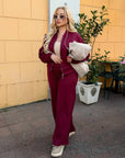 Suede bomber jacket and trouser set, IT brand, polyester, viscose and elastane, shown in the photo.