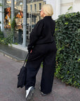 Suede bomber jacket and trouser set from IT, polyester, viscose and elastane, in beige, with textured surface.