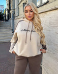 Suede tracksuit IT with polyester, viscose and elastane, image of complete model in sporty style.