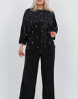 Velvet dress with pearls, with viscose, cotton and elastane, elegant design, shown in the image.