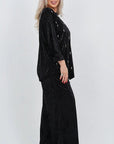 Velvet dress with pearls, with high-quality viscose, cotton and elastane, elegant design and delicate pearls.