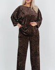 Velvet dress with pearls, with viscose, cotton and elastane, shown in the image.