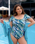 Printed one-piece swimsuit with ruffles от polyester, модерен дизайн и ярки цветове, подходящ за плаж и плажни забавlinenия.