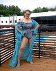 Printed one-piece swimsuit with ruffles от polyester, с ярки цветни мотиви и женствен дизайн.