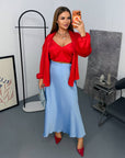 Midi skirt NewYear25 made from polyester and cotton, shown on a model with a stylish design and colourful pattern.