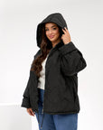 Lightweight hooded jacket made from polyester, white, suitable for spring and autumn, with hood and long sleeves.