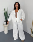 Hooded knit set, composed of cotton, polyester and elastane, in pleasant design and comfortable cut.