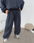 Hooded knit set, white, made from cotton, polyester and elastane, for comfort and style.