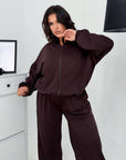 Hooded knit set made from cotton and polyester, suitable for comfort and style.
