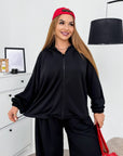 Hooded knit set made from cotton, polyester and elastane, soft and comfortable for wear, shown in the image.