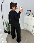 Soft button-up pyjamas made from viscose and polyester, comfortable for night wear, photo of the product in white and pink.