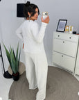 Soft button-up pyjamas made from viscose and polyester, image of cosy and comfortable model.