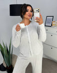 Soft button-up pyjamas made from viscose and polyester, comfortable for sleep and relaxation, image of product photo.