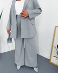 Striped business-style set with polyester, viscose and spandex, shown in the image.
