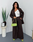 Striped business-style set with polyester and viscose, suitable for office or business clothes, shown in the image.
