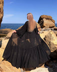 Long beach tunic от viscose и polyester, светла и свободна, подходяща за летен плаж и море.
