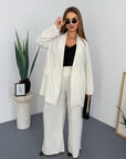 Striped business-style set with polyester, viscose and spandex, image of elegant outfit for business or office.
