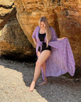 Long printed beach tunic от viscose и polyester със свеж летен дизайн, подходяща за плаж или летни разходки.
