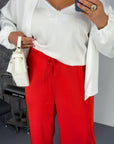Wide satin trousers with smooth design, made from polyester and elastane, in elegant and comfortable style.