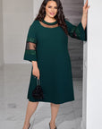 Sukienka z błyszczącymi rękawami z siateczki